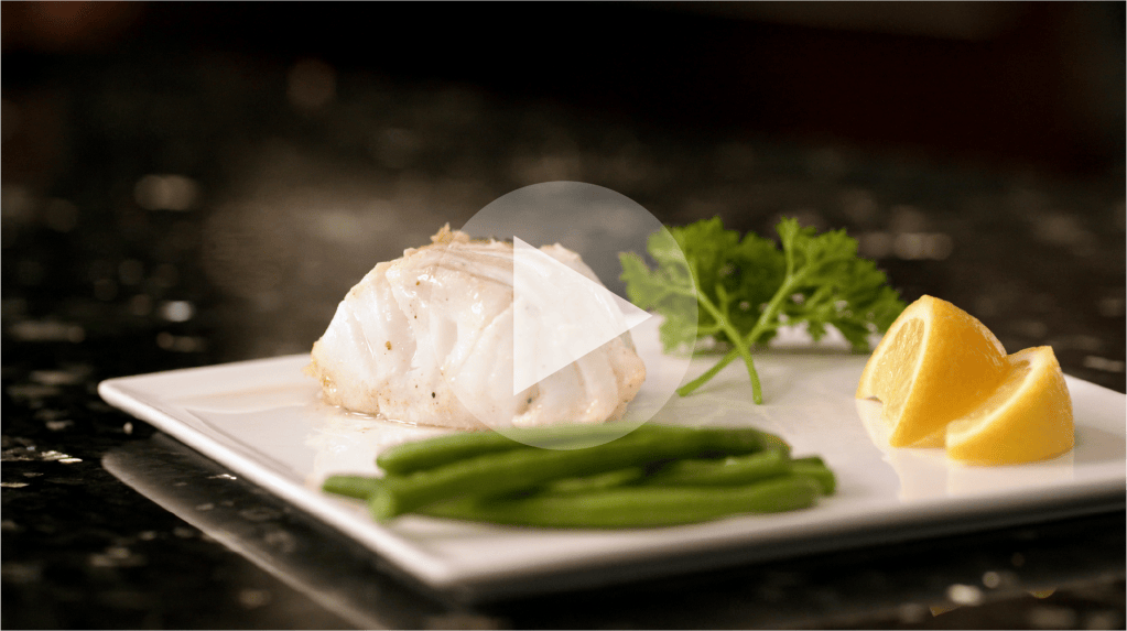 1640 Wild Atlantic cod cooked and plated with vegetables